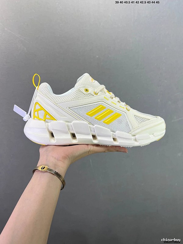 Adidas Cage Runners in White and Yellow with Dynamic Sole Shape