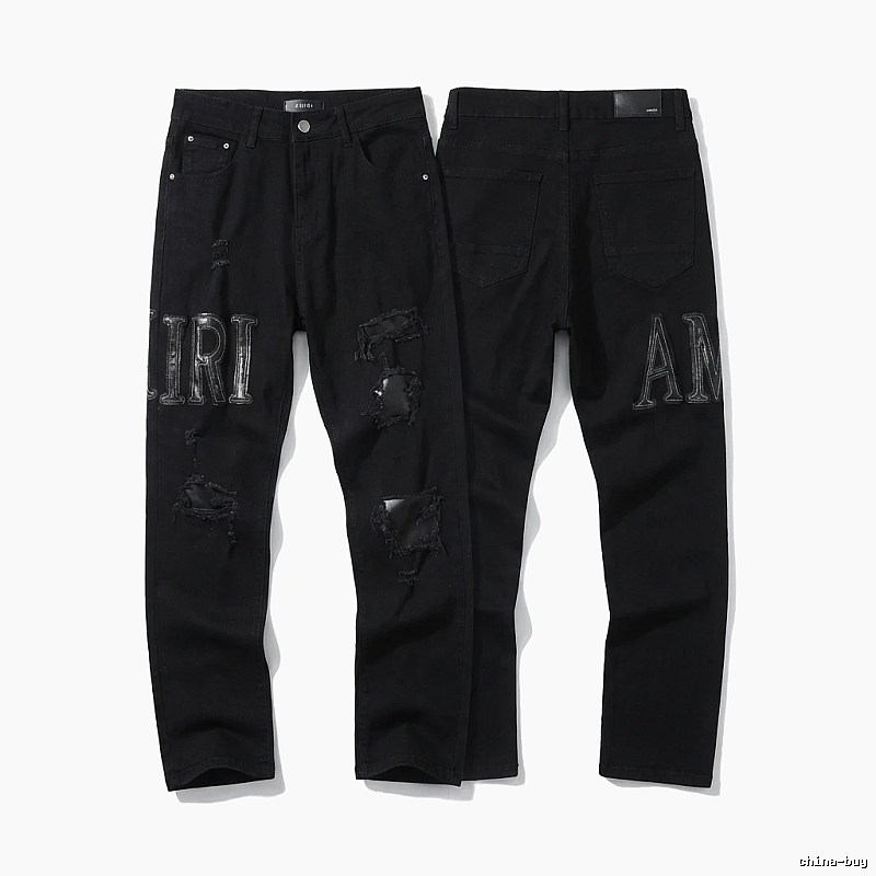 AMIRI Trendy Black Jeans with Holes