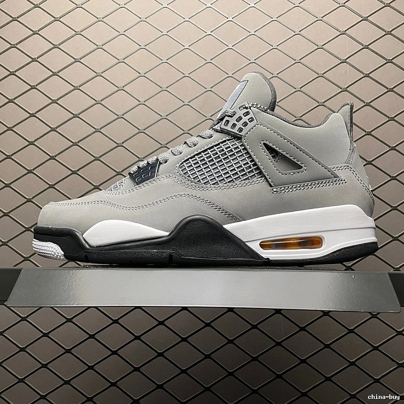Jordan Gray and Black Basketball High-Tops Highlighting Color-Blocked Panels
