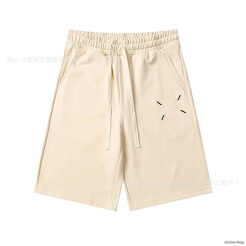 Maison Margiela minimalist style beige shorts