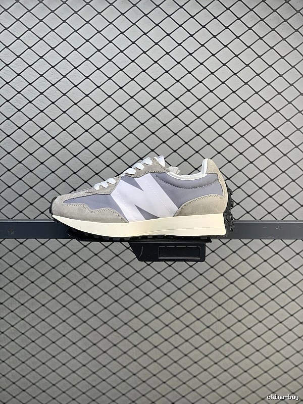 New Balance Pale Gray Retro Runners Highlighting Dynamic Sole Shape