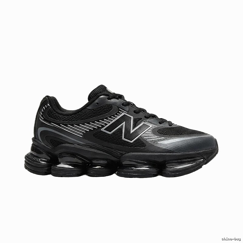 New Balance retro-style black and grey sports shoes