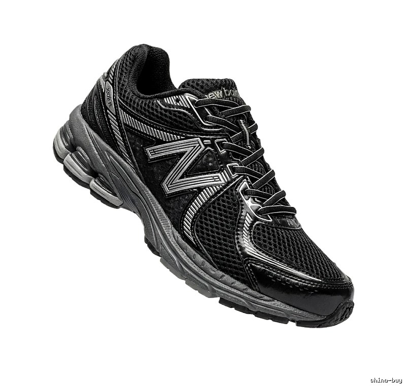 New Balance retro-style black and grey sports shoes