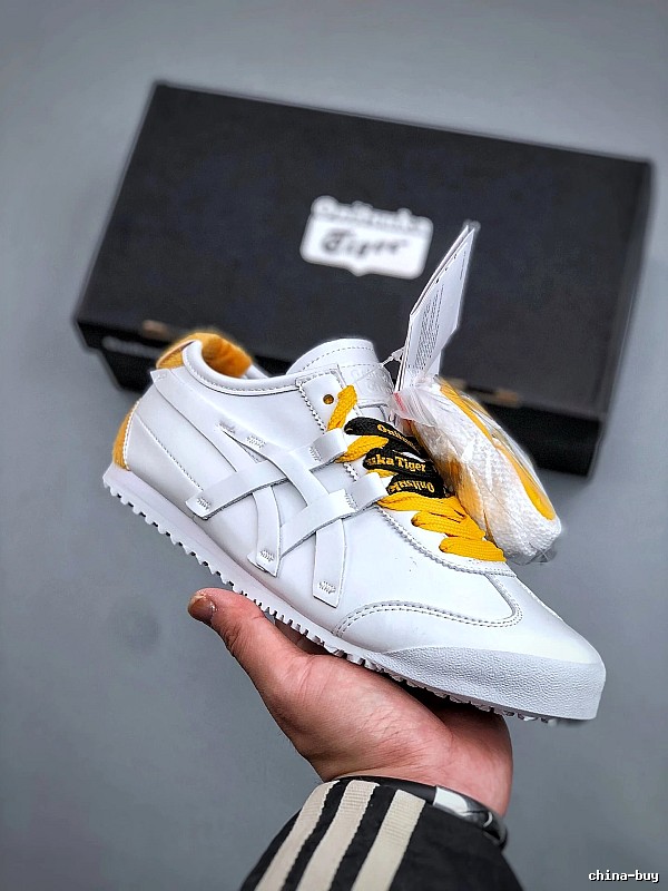 Onitsuka Tiger White and Yellow Low-Top Sneakers Highlighting Vintage-Inspired Shape