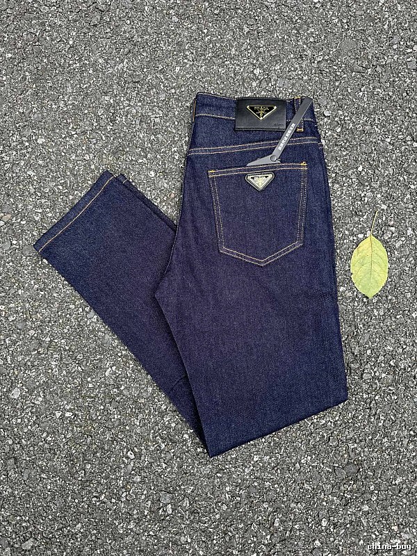 Prada Dark Indigo Logo Jeans with triangle badge hardware and contrast pocket stitching