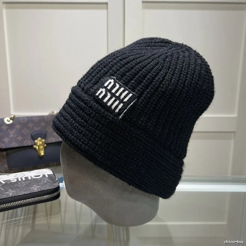 White Miu Miu Ribbed Knit Beanie for Layered Winter Looks